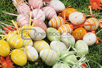 Easter eggs hidden in natural straw nest