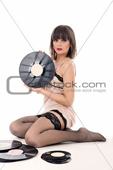 Beautiful girl holding record
