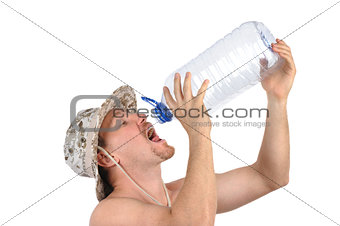 young man drinks from empty bottle