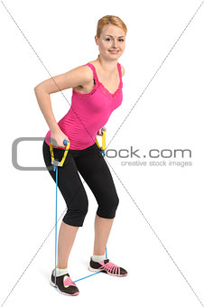 Back and arms exercise using rubber resistance band