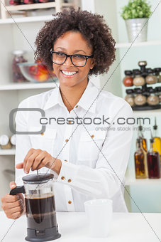 Mixed Race African American Girl Making Coffee