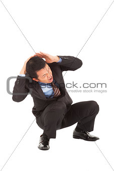  businessman scared and protect his head