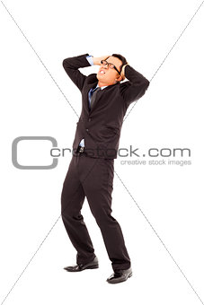 Businessman have a  headache and bend body
