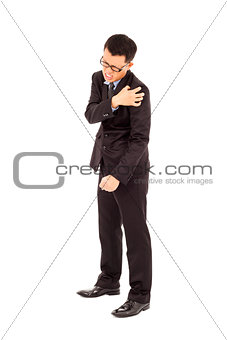 Young businessman having  shoulder pain