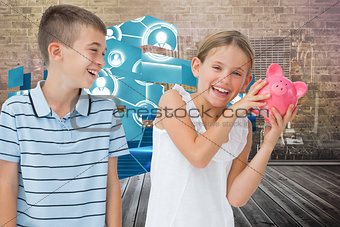 Composite image of smiling young girl holding piggy bank