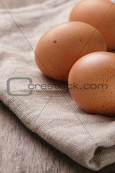 speckled chicken eggs or old table