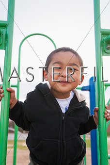 Young smiling Asian boy at the playground