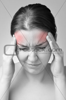 Young woman having migraine