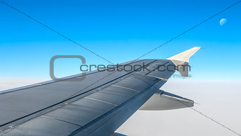 Looking through window aircraft during flight in wing with a nic