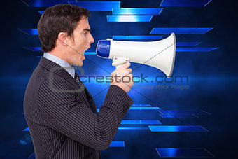 Composite image of profile of a businessman shouting through a megaphone