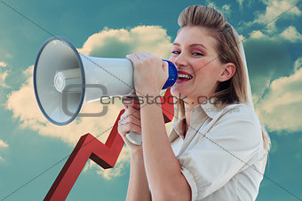 Composite image of beautiful businesswoman shouting through megaphone