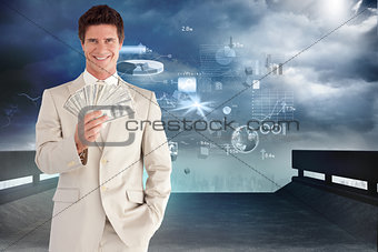 Composite image of positive businessman looking at the camera