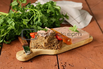 gourmet liver pate with black rye bread rustic style