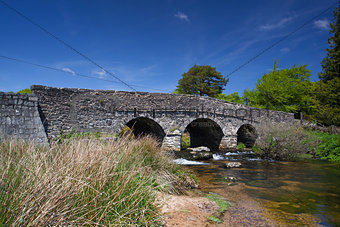 The ancient clapper bridge at Postbridges in Dartmoor National P