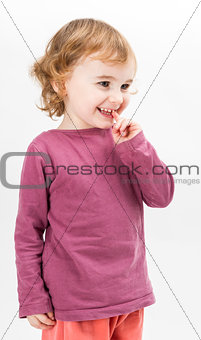 abashed young girl in light grey background