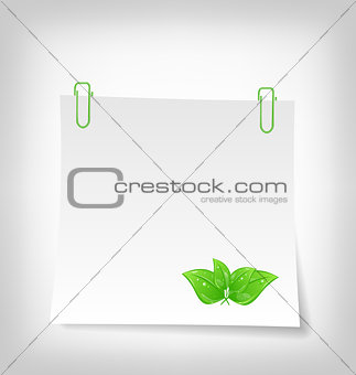 blank note paper with green leaves, isolated on white background