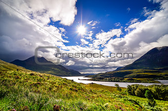 Scenic view of the lake and mountains, Inverpolly, Scotland