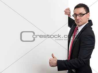 Happy business man showing blank signboard