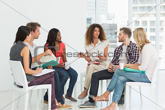 Therapist speaking to a rehab group