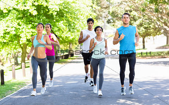 Marathon athletes running on street
