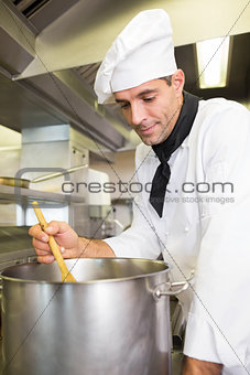 Male chef preparing food in kitchen
