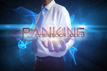 Businessman presenting the word ranking