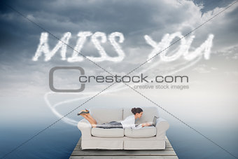Miss you against cloudy sky over ocean