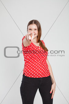 Attractive woman pointing