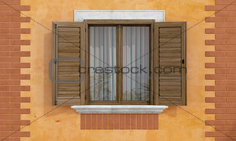 Old facade with wooden windows