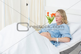 Woman suffering from labor pains