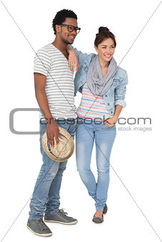 Full length of a smiling cool young couple