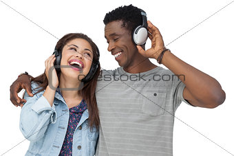 Portrait of a young couple enjoying music
