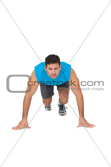 Portrait of a determined young man doing push ups