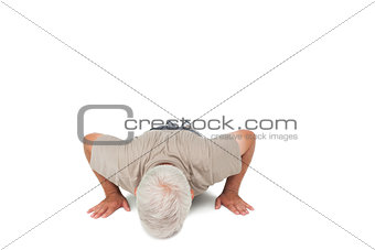 Senior man doing push ups