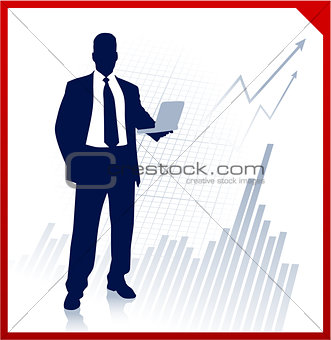Businessman holding computer with Graph