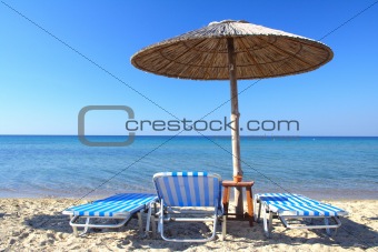 beach umbrella and chair