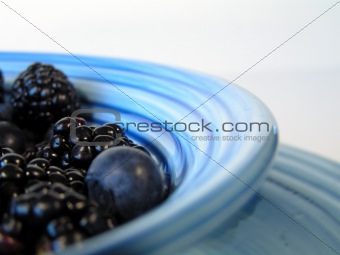 berries in blue bowl 