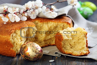 Flowering branch of apricot and Italian Easter bread.