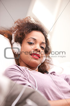 beautiful afroamerican woman on a sofa