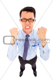 angry businessman make a fist  to yell