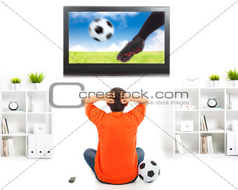  fan watching soccer game and feeling nervous