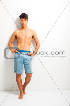 Sexy portrait of a muscular shirtless male model 