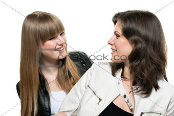 Two woman look each other