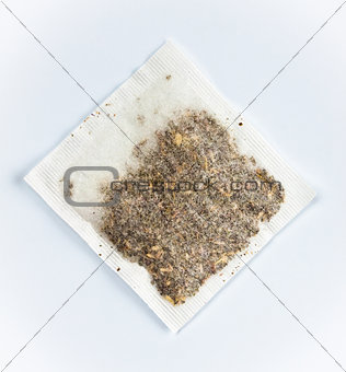 herbal tea bag laying on table