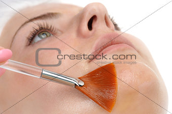 facial peeling mask applying