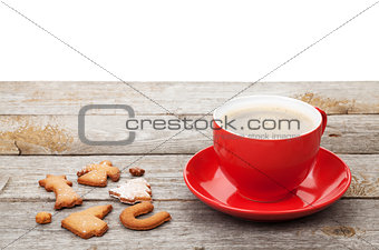 Coffee cup and gingerbread cookies