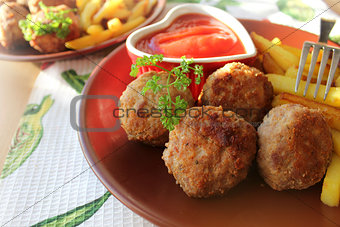 Meat balls with sauce and potatoes