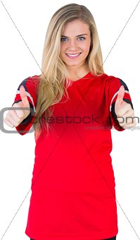 Pretty football fan in red