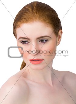 Beautiful redhead posing with hair tied