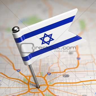 Israel Small Flag on a Map Background.